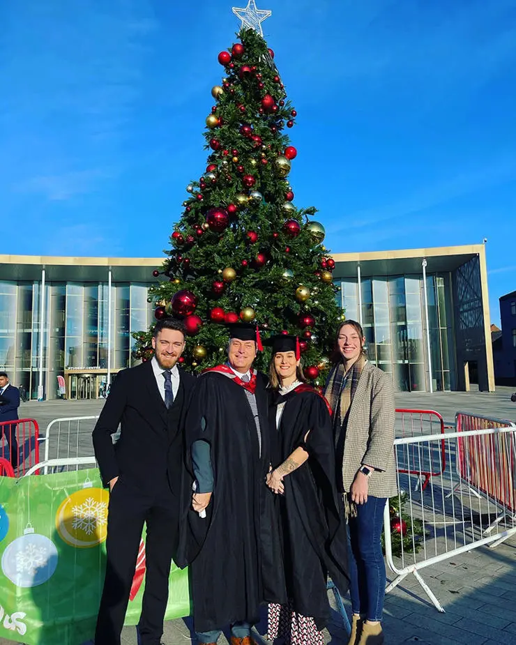 (L-R) Connor McKiernan, Peter McKiernan, Jade Johnson and Peter’s daughter Imogen McKiernan at Peter and Jade’s UCLan graduation ceremony in December 2021.