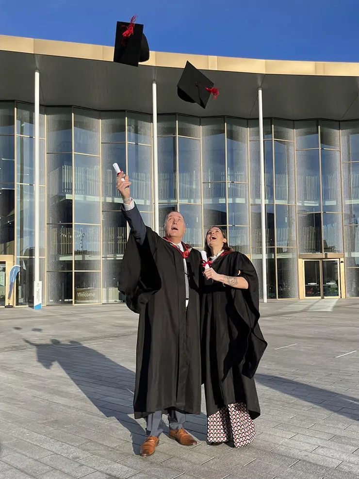 Peter McKiernan and his partner Jade Johnson outside of the UCLan Student Centre at their graduation ceremony.