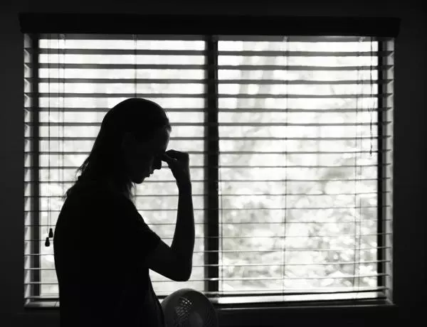 silhouette  of distressed woman