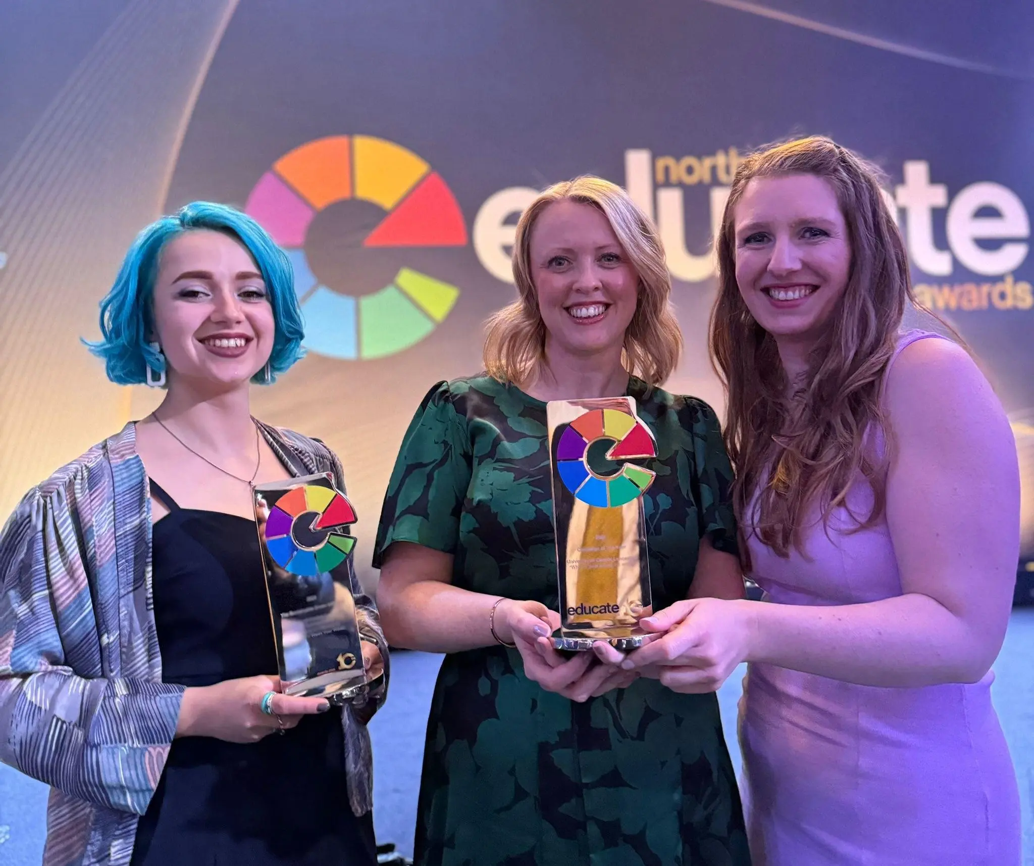 (L-R) Ecaterina Stefanescu (Lecturer in Architecture), Louise Finch (Senior Internal Communications Officer) and Helen O’Rourke (Wellbeing Advisor) with the University of Central Lancashire’s two awards