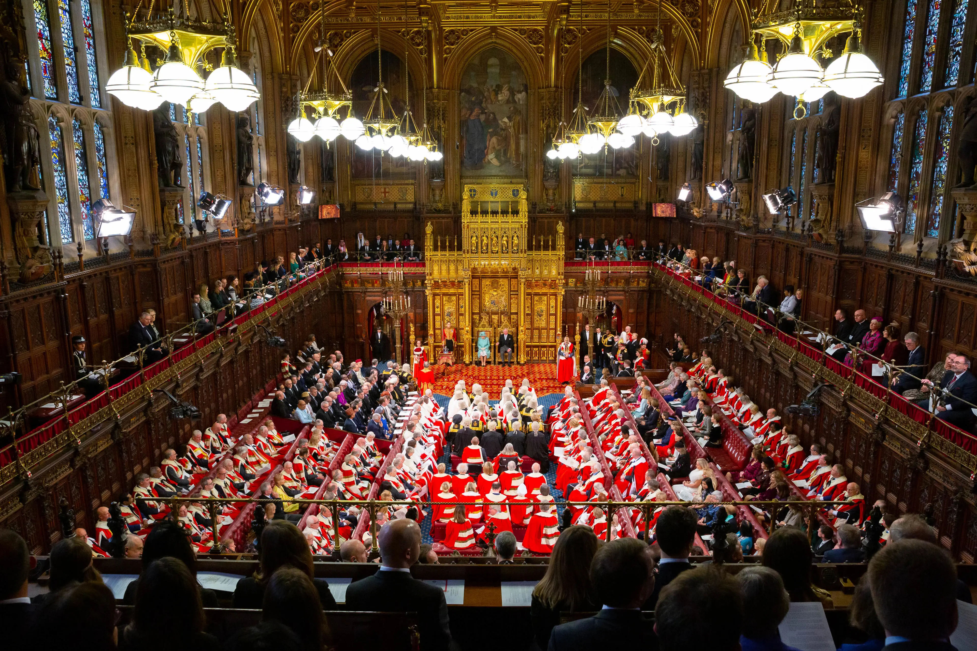 Peers and the Queen inside the large House of Lords