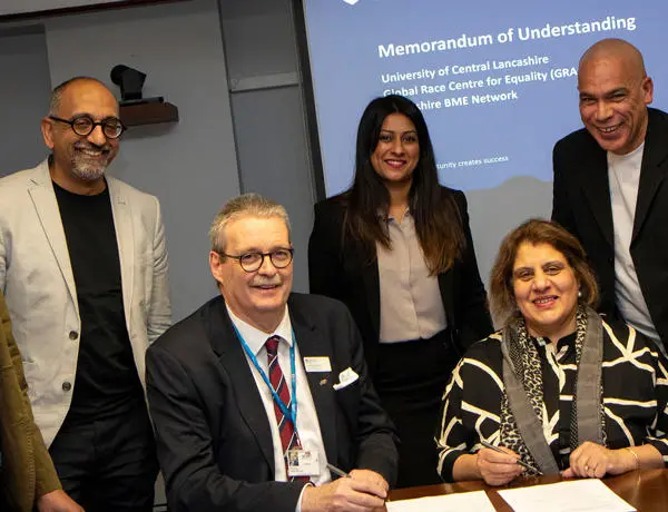 Representatives from UCLan's GRACE and Lancashire BME Network at the MOU signing