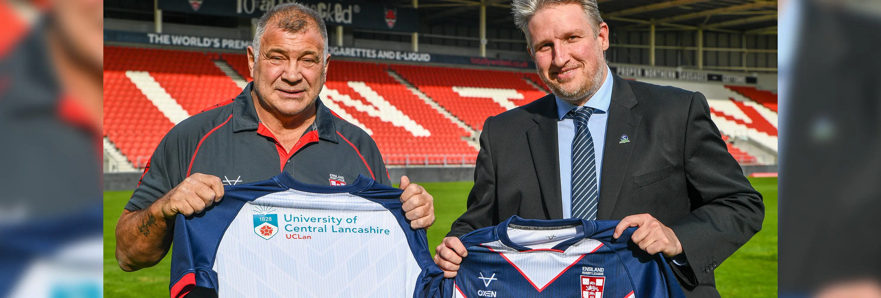 Shaun Wane, England Men’s Head Coach (left) with Bryan Jones, the Dean of School of Health, Social Work and Sport at UCLan with the new England shirt.