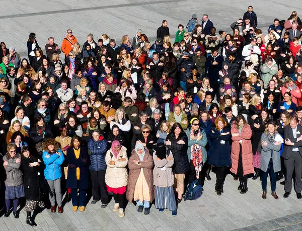 Staff and students gather on University Square to celebrate International Women's Day
