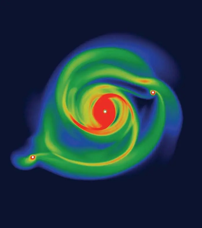 Computer simulation of planets forming in a protostellar disc.