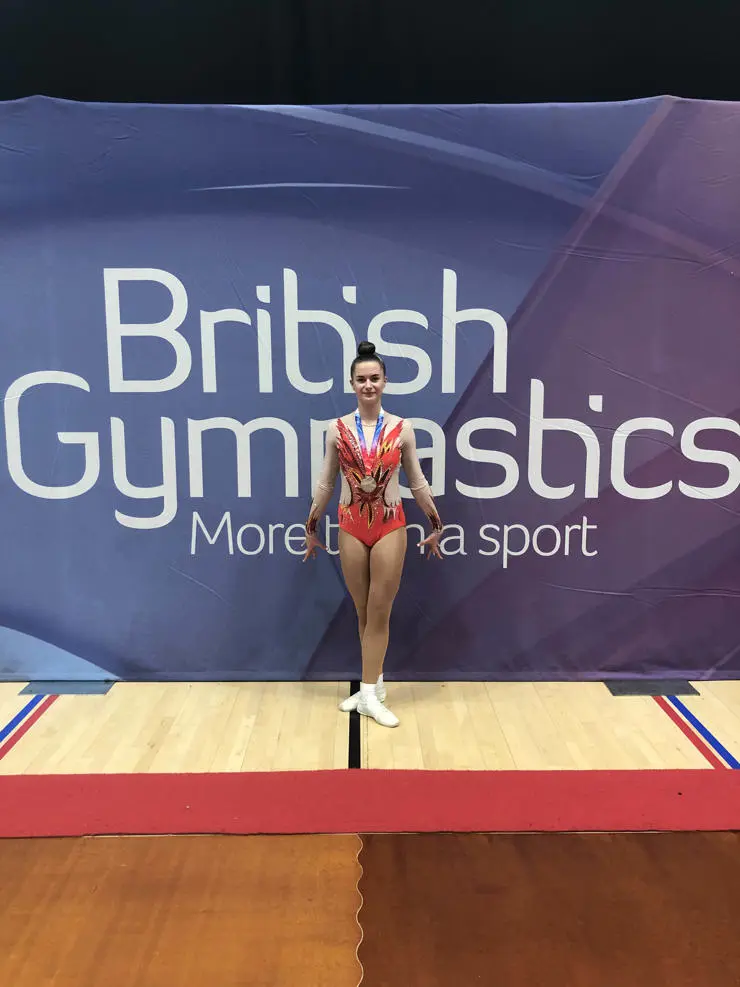 Freya Abrams with her silver medal at the 2021 British Championships at Surrey Sports Park. 