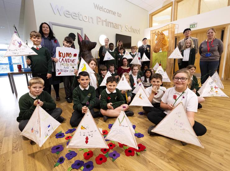 Pupils from Weeton Primary School show off their Remembrance lanterns ahead of the service.