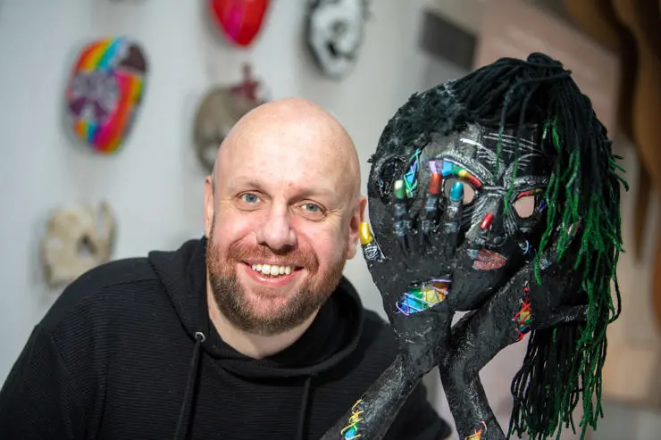Christian Garlick with one of his visual masks