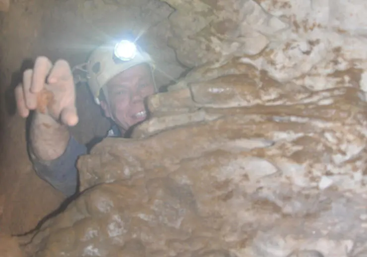 Dr Rick Peterson in a cave