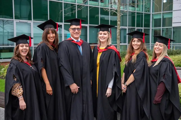 The first social work degree apprentices in England, from l-r Caitlin Balshaw, Nicola Fielding, Nick Henson, Lauren Housby, Selene Costine and Katie Keegan