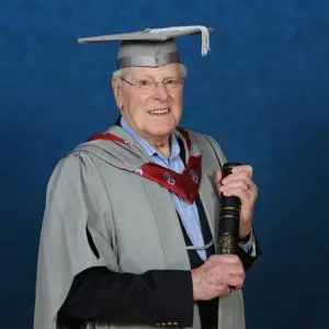 Peter Purves holding a scroll