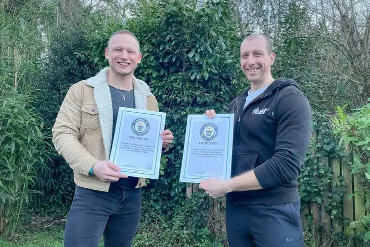 John Darwen and James Baker with their Guinness World Record certificates