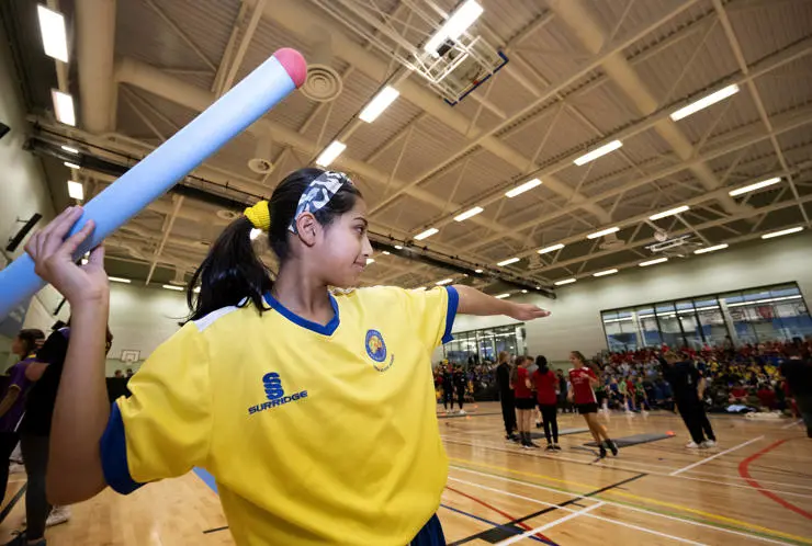 A Queen's Drive Primary School pupil about to throw a javelin