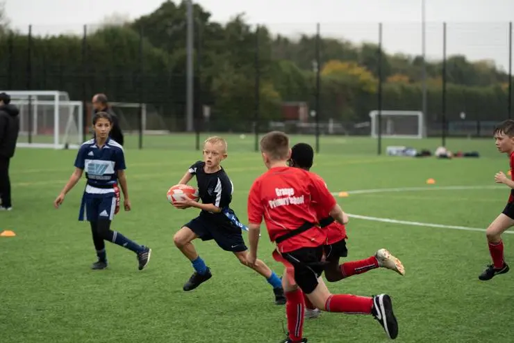 Pupils from Preston primary schools taking part in the Inspired by Wales Rugby League Tag Rugby League World Cup Festival