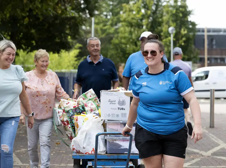 Volunteers moving possessions into halls of residence