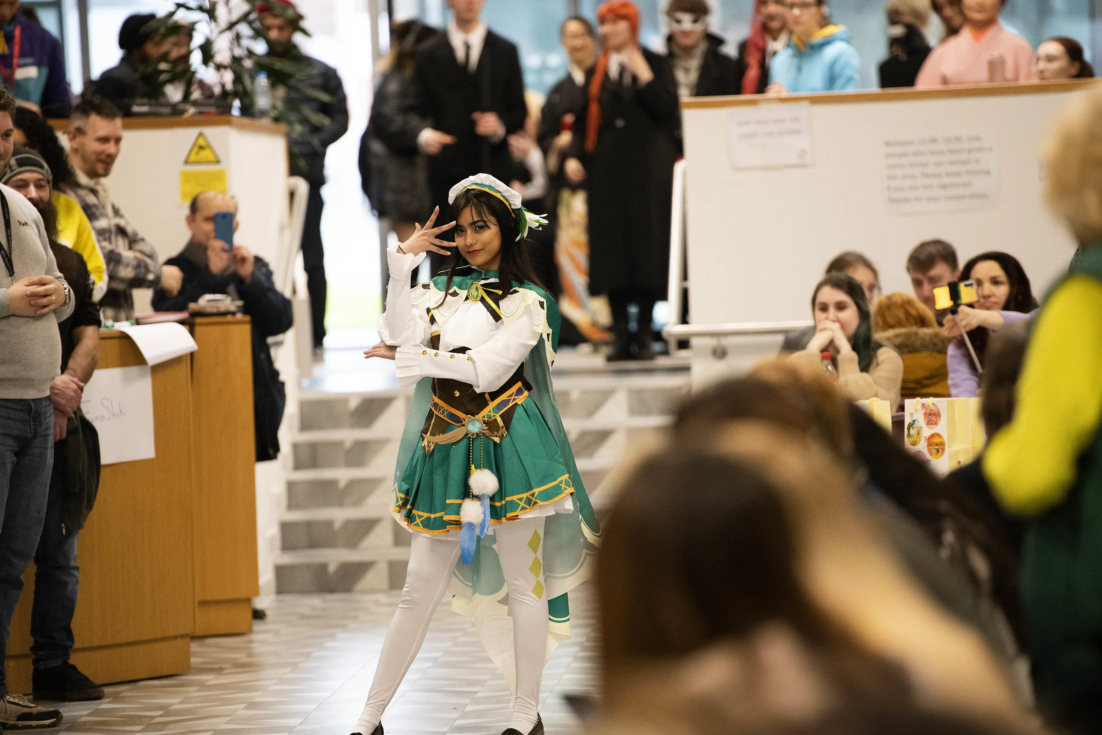 Students cosplay on the catwalk, taking on different Japanese videogame characters