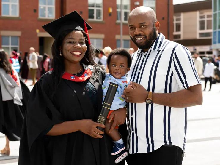 New UCLan graduate Victoria Chinonye Chukwuma with her six-month-old son Miracle and husband Fabian Toochukwu Okeke