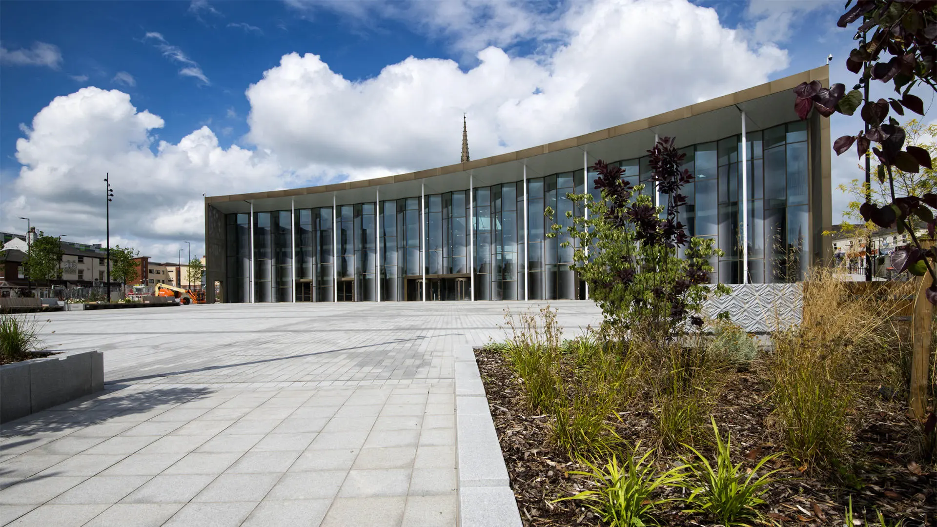 the new student square and the front of the student centre with the church spire in the background
